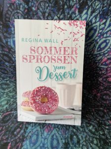 Buchcover: Sommersprossen zum Dessert von Regina Wall mit Donuts mit pinkem Zuckerguss